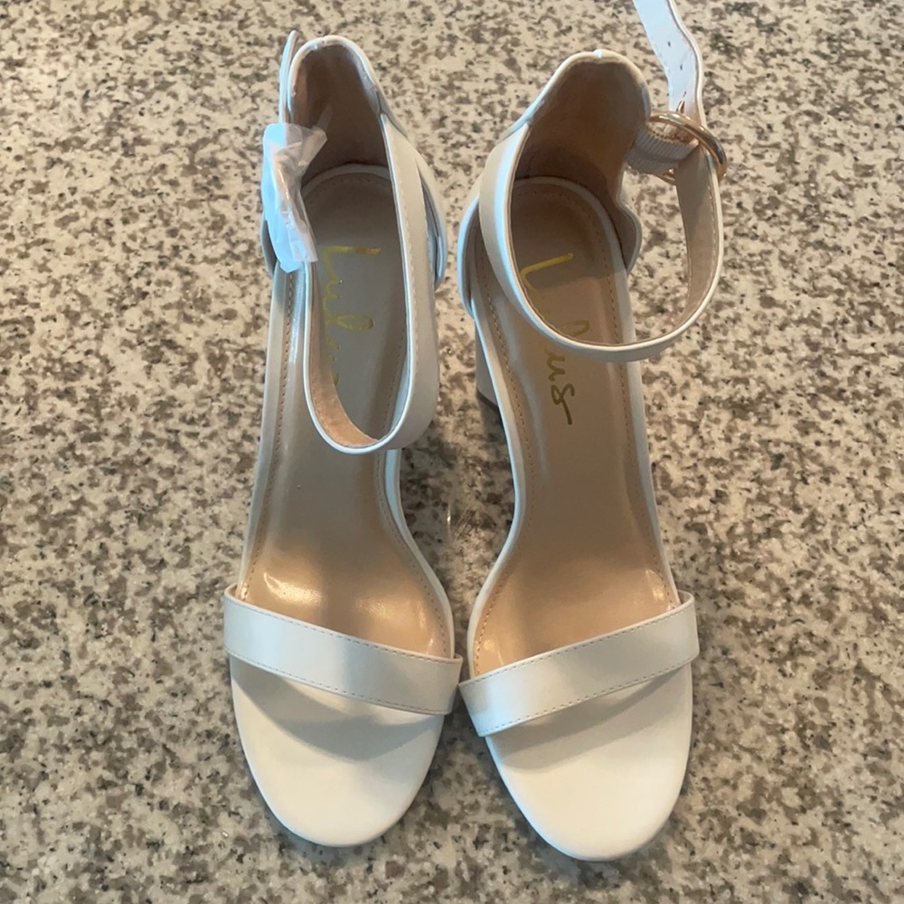 Never worn heeled sandals